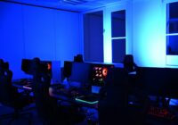 people sitting on chair in front of computer